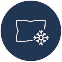 Icon für Schlafklima, ein blauer, runder Kreis mit dem Icon von einem Kopfkissen und einer Schneeflocke.
